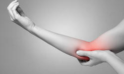 Woman with elbow pain